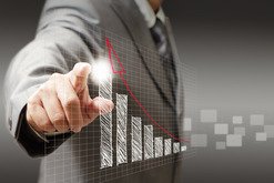 man pointing to rising graph